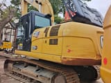 2024 Caterpillar 320GX crawler excavator, rear three-quarter view