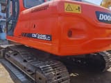2021 Doosan DX225LC crawler excavator rear three-quarter view