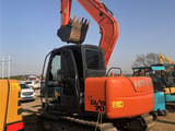 2024 Hitachi Zaxis 70 mini excavator, rear three-quarter view