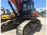 2022 Doosan DX520 crawler excavator, front three-quarter view