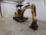 2022 Caterpillar 303C mini excavator, front three-quarter view