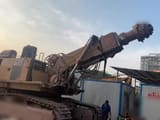 2016 Caterpillar 6015FS crawler excavator with drum cutter attachment