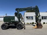 2009 New Holland MH-PLUS wheel excavator, side view