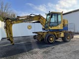 2000 CASE 788-PRR wheel excavator, side profile view