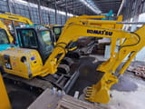 2015 Komatsu PC58 mini excavator, high-angle side view