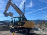 2015 Caterpillar M320F wheel excavator, side view