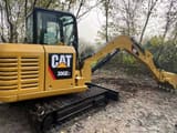 2022 Caterpillar 306E2 mini excavator, rear three-quarter view