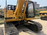 2022 Caterpillar 320B crawler excavator rear three-quarter view