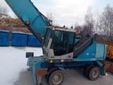 2010 Fuchs MHL350 material handler, side view