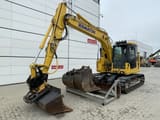 2022 Komatsu PC138US-11 crawler excavator, front three-quarter view