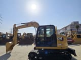 2023 Caterpillar 308E2 mini excavator, side profile view