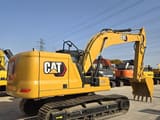 2023 Caterpillar 323GC crawler excavator, rear three-quarter view