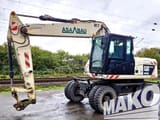 2012 CAT M316D wheel excavator, side view