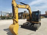 2023 Caterpillar 307E2 excavator, front three-quarter view