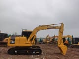 Komatsu PC130 crawler excavator, side profile view