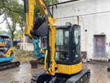 2023 Caterpillar 303.5 C CR mini excavator, front three-quarter view