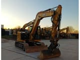 2023 Caterpillar 308 crawler excavator, front three-quarter view