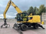 2015 Caterpillar MH3022 material handler, side view