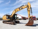 2014 Caterpillar 329E crawler excavator, side profile view