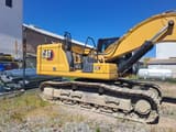 2021 Caterpillar 330 crawler excavator, side view