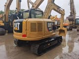 2018 Caterpillar 307E2 mini excavator, rear three-quarter view