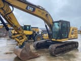 2018 Caterpillar 320 crawler excavator, side view