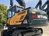 Hyundai HX130 Crawler Excavator, rear three-quarter view