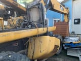 2011 Caterpillar M318D wheel excavator, side view of engine compartment
