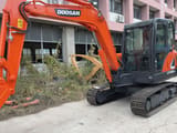 Doosan DX60-9C mini excavator, side view