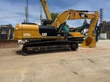 2015 Caterpillar 325CL crawler excavator, side profile view