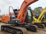 2000 Hitachi Zaxis 120 crawler excavator, side view