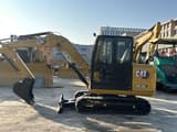 2024 Caterpillar 305.5E2 mini excavator, side view