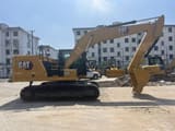 2024 Caterpillar 320GC crawler excavator, side view