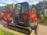 2022 Doosan DX60LC-9C mini excavator, rear three-quarter view