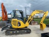 2022 Komatsu PC-55MR mini excavator, side view