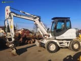 2012 CASE WX125 wheel excavator side view