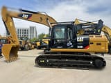 2009 Caterpillar 323DL crawler excavator, side profile view