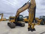 2022 Caterpillar 323 crawler excavator, side view