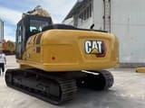 Caterpillar 320GC crawler excavator, rear three-quarter view