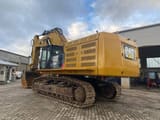 2015 Caterpillar 390FLME crawler excavator, rear three-quarter view
