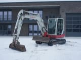 2012 Takeuchi TB250 mini excavator, side profile view