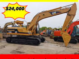 2012 Caterpillar 320BL crawler excavator, side profile view
