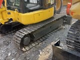 Komatsu PC30MR mini excavator side view of tracks and cab