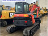 2021 Kubota U55-5 mini excavator, rear three-quarter view