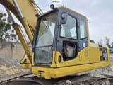 2006 Komatsu PC240NLC excavator cab and boom view