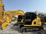 2024 Komatsu PC70-8 mini excavator, side profile view
