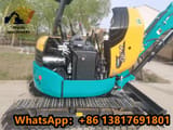 2023 Kubota U-30 mini excavator side view with engine compartment open
