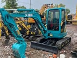 Kubota KX135 mini excavator, front three-quarter view