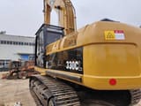 Caterpillar 330CL crawler excavator, rear three-quarter view