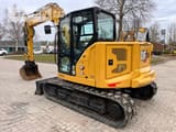 2023 Caterpillar 308-07A mini excavator, rear three-quarter view